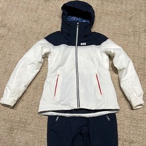 Helly Hansen ski pants and jacket. Navy and white. Large jacket. Medium pants.